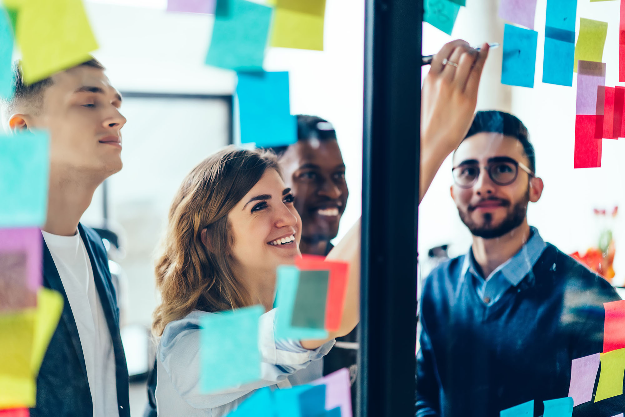 Group at board with sticky notes