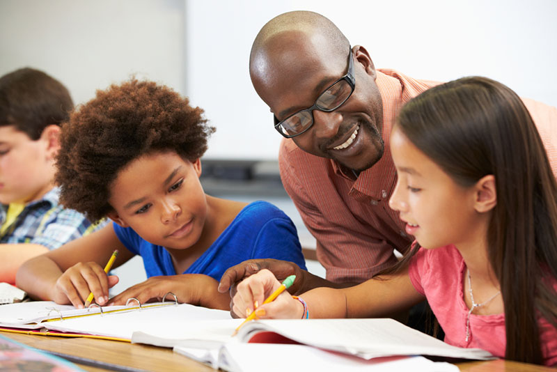 Teacher with students