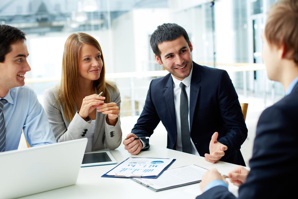 Business meeting around a table